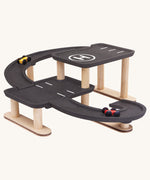 The PlanToys PlanWorld Race N Play Parking Garage on a plain background.