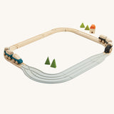 The PlanToys Rubber Road and Rail Adaptor Tracks in use with a wooden railway track and straight pieces of the PlanToys rubber
road and rail set.