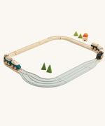 The PlanToys Rubber Road and Rail Adaptor Tracks in use with a wooden railway track and straight pieces of the PlanToys rubber
road and rail set.