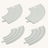 Plan Toys Rubber Road and Rail Extension Curves on a plain background.