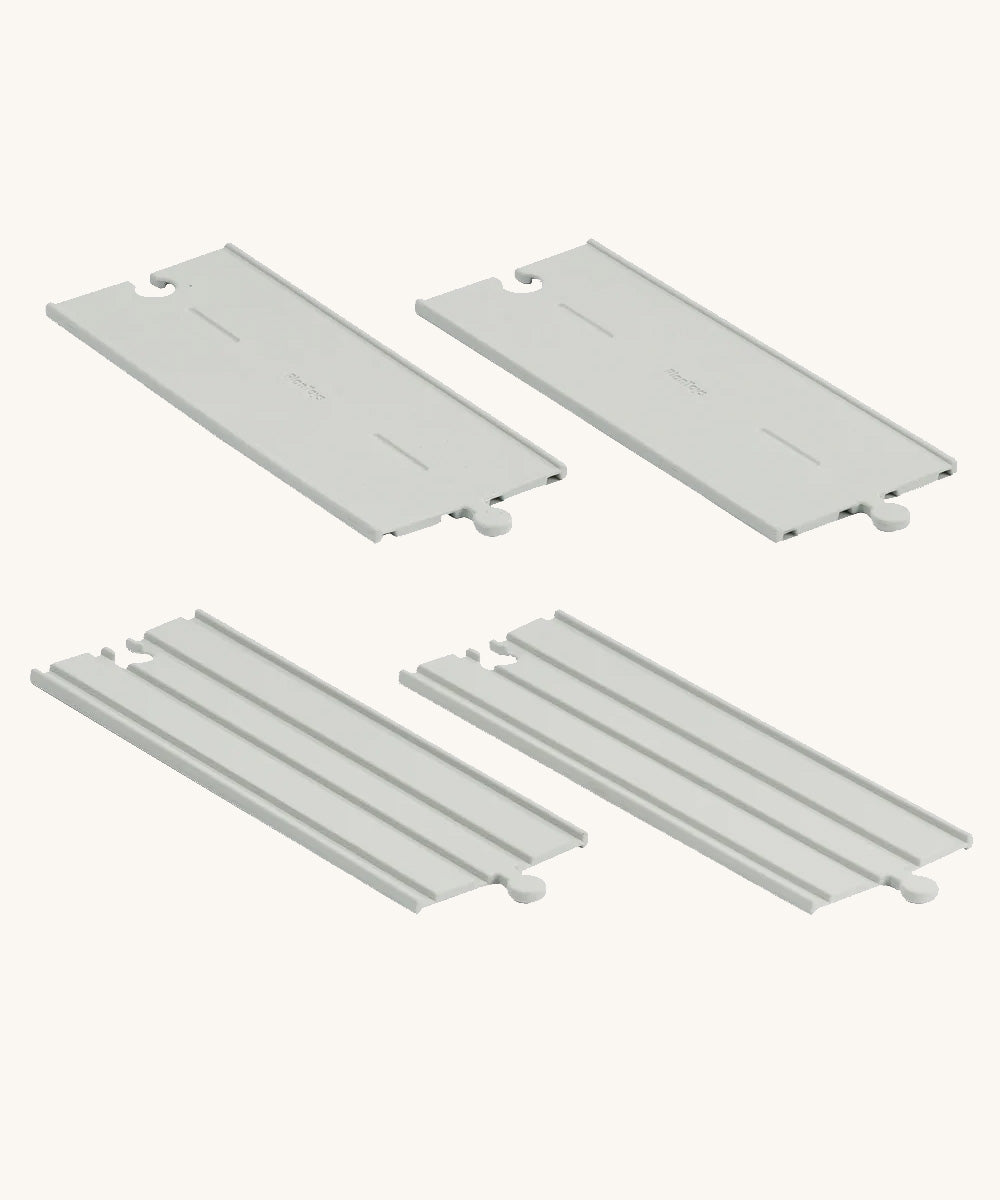 PlanToys Rubber Road and Rail Extension Straights on a plain background.