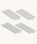 PlanToys Rubber Road and Rail Extension Straights on a plain background.