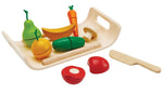 The PlanToys Assorted Fruit & Vegetables Tray play food set including orange