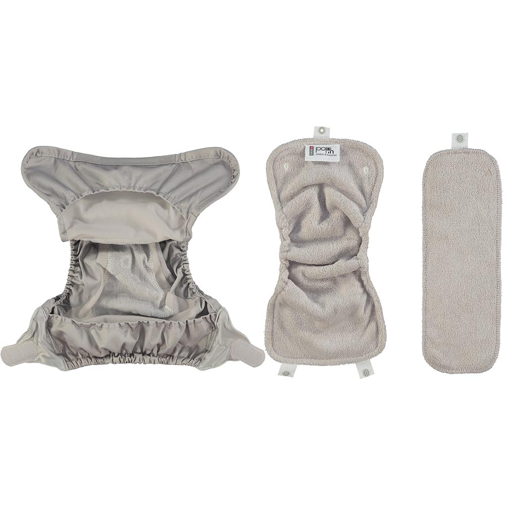 All three parts of the Close Pop-In reusable cloth nappy with adjustable velcro