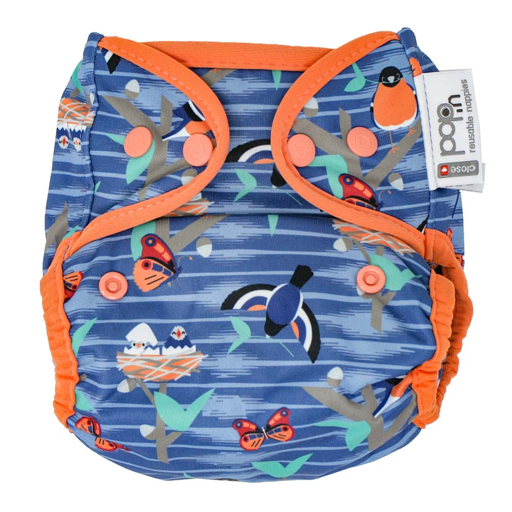 The Close Pop-In +bamboo reusable cloth nappy with adjustable popper closures, in a twilight garden print