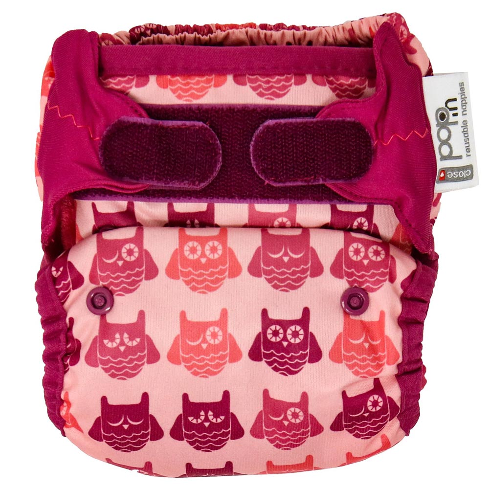 The Close Pop-In +bamboo reusable cloth nappy with adjustable velcro closures, in a vintage pink owl print