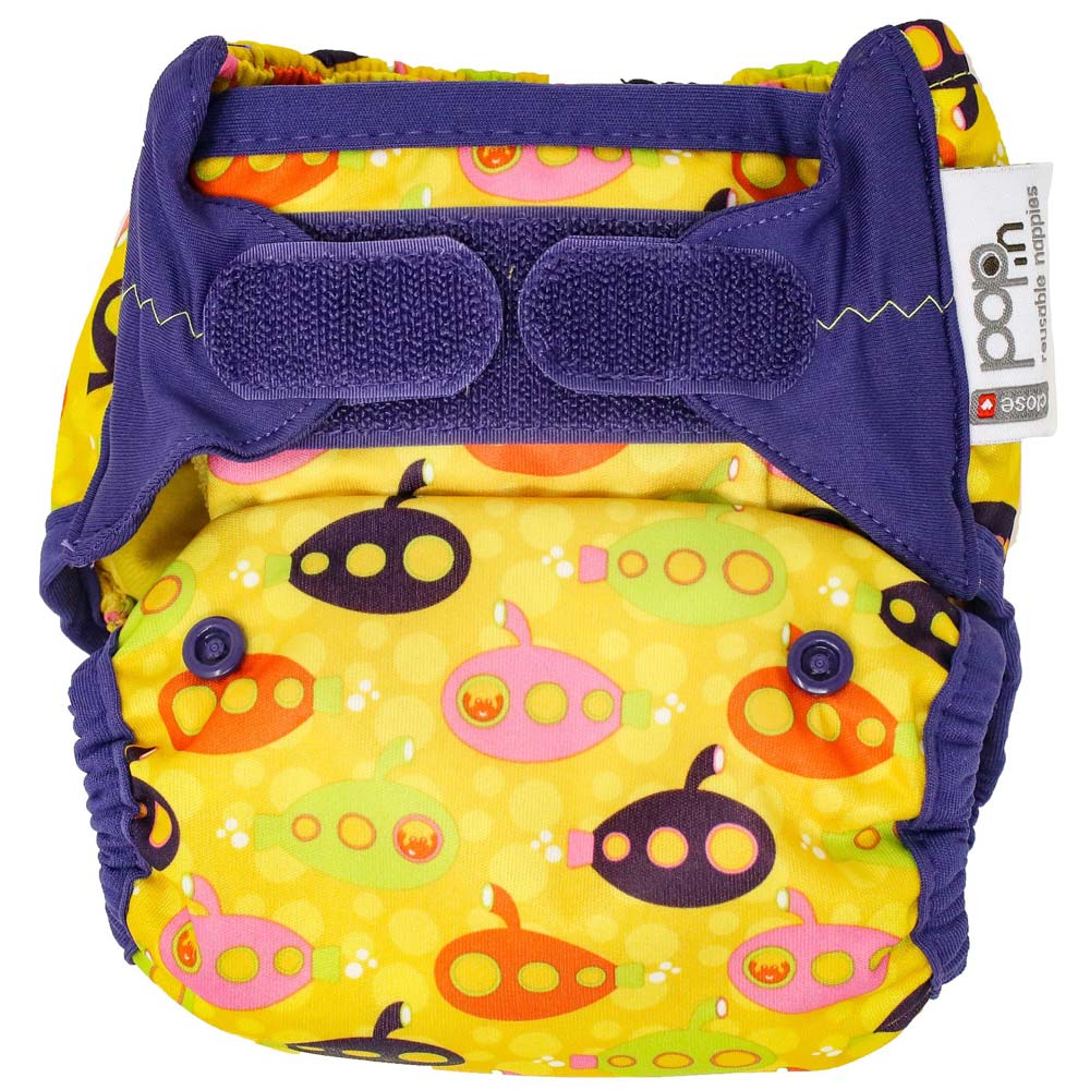The Close Pop-In +bamboo reusable cloth nappy with adjustable velcro closures, in a vintage yellow submarine print