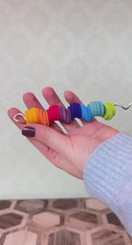 Grimm's Spirelli, a satisfying spiral wooden fidget toy, for sale at Babipur.