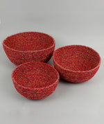 A close up of the 3 Respiin multicoloured recycled cotton bowls spread out showing the size difference