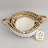 A close up of the Respiin white and natural jute handled bowls showing each bowl inside each other