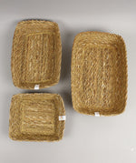 A top down view of the Respiin rectangular seagrass baskets showing the size difference between each basket