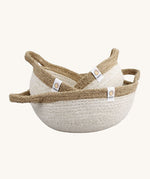 A set of 3 Respiin jute handled bowls in white and natural. Showing the smaller bowls inside the larger bowl.