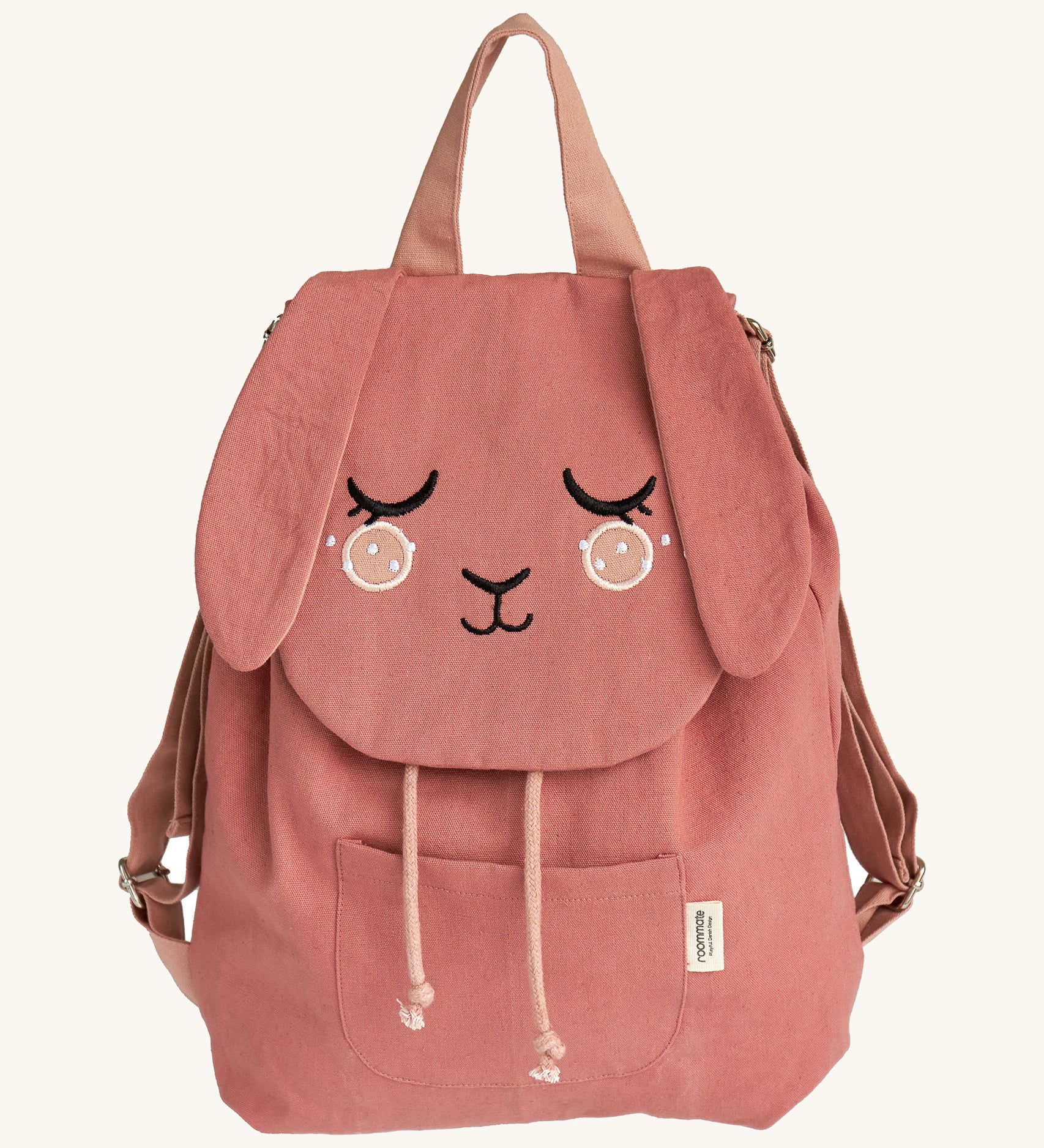 The Roommate organic cotton canvas backpack for ids and toddlers, in pink with funny features.