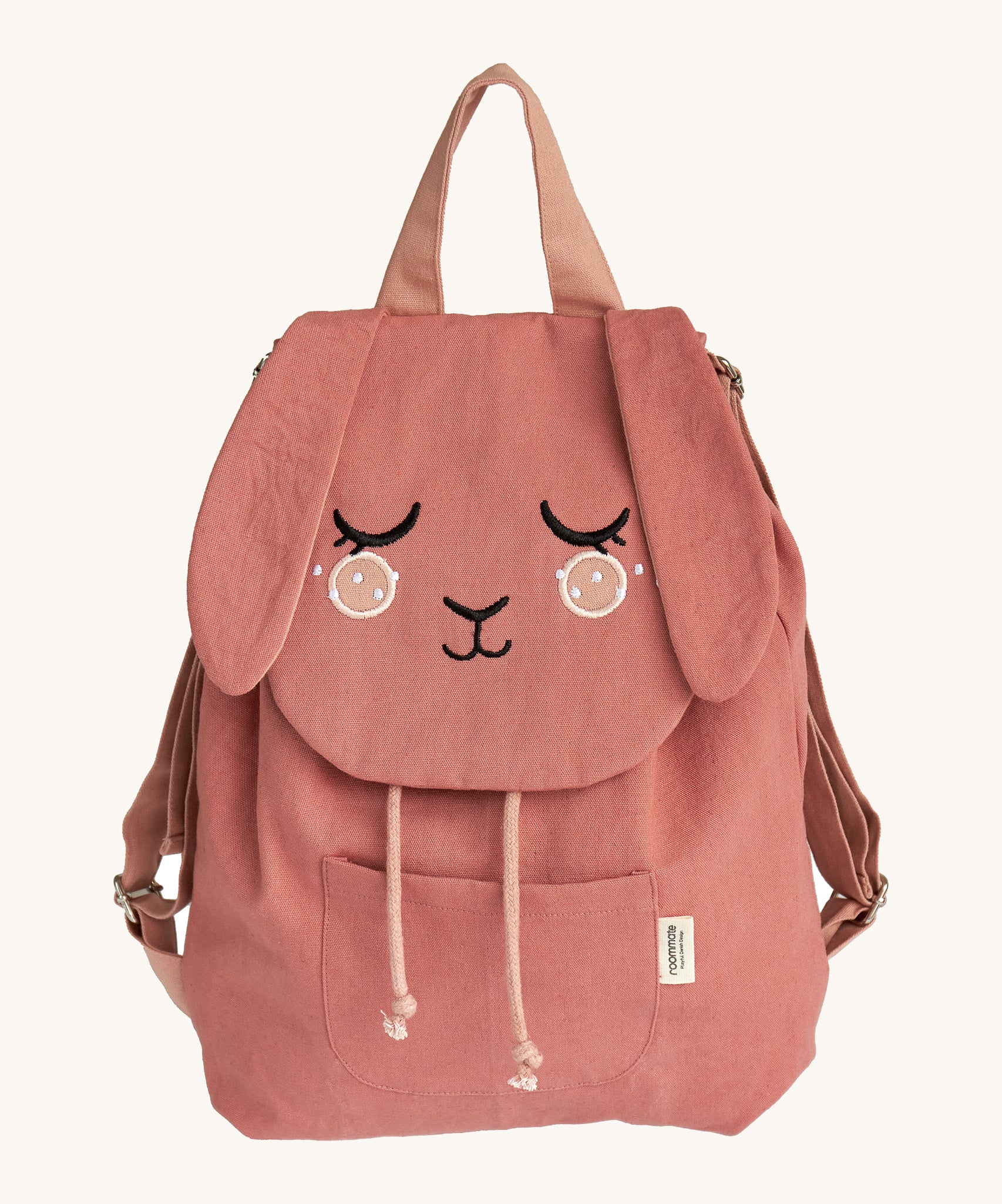 The Roommate organic cotton canvas backpack for ids and toddlers, in pink with funny features.
