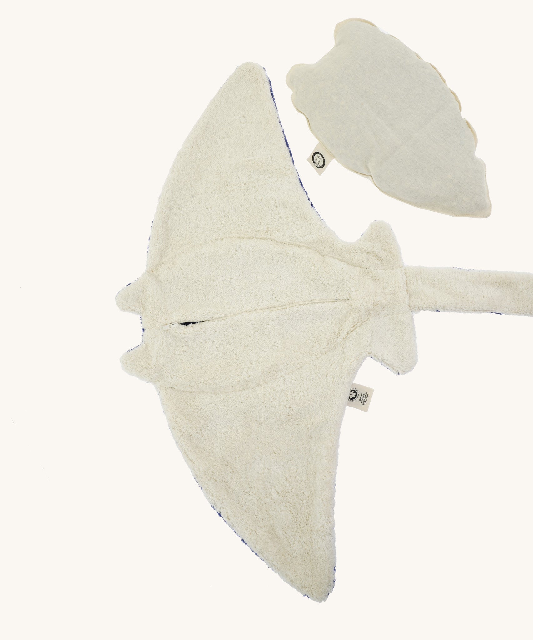 The under side of the Senger large blue manta ray cuddly toy, with the heatable bag taken out