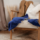 The large and small Senger organic cotton cuddly blue manta ray stuffed toys