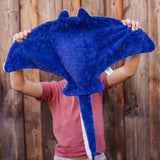 A person holding up the Senger organic cotton stuffed manta ray cuddly toy