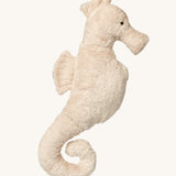 A side view of the small Senger Cuddly Sea Animal Seahorse Organic Soft Toy