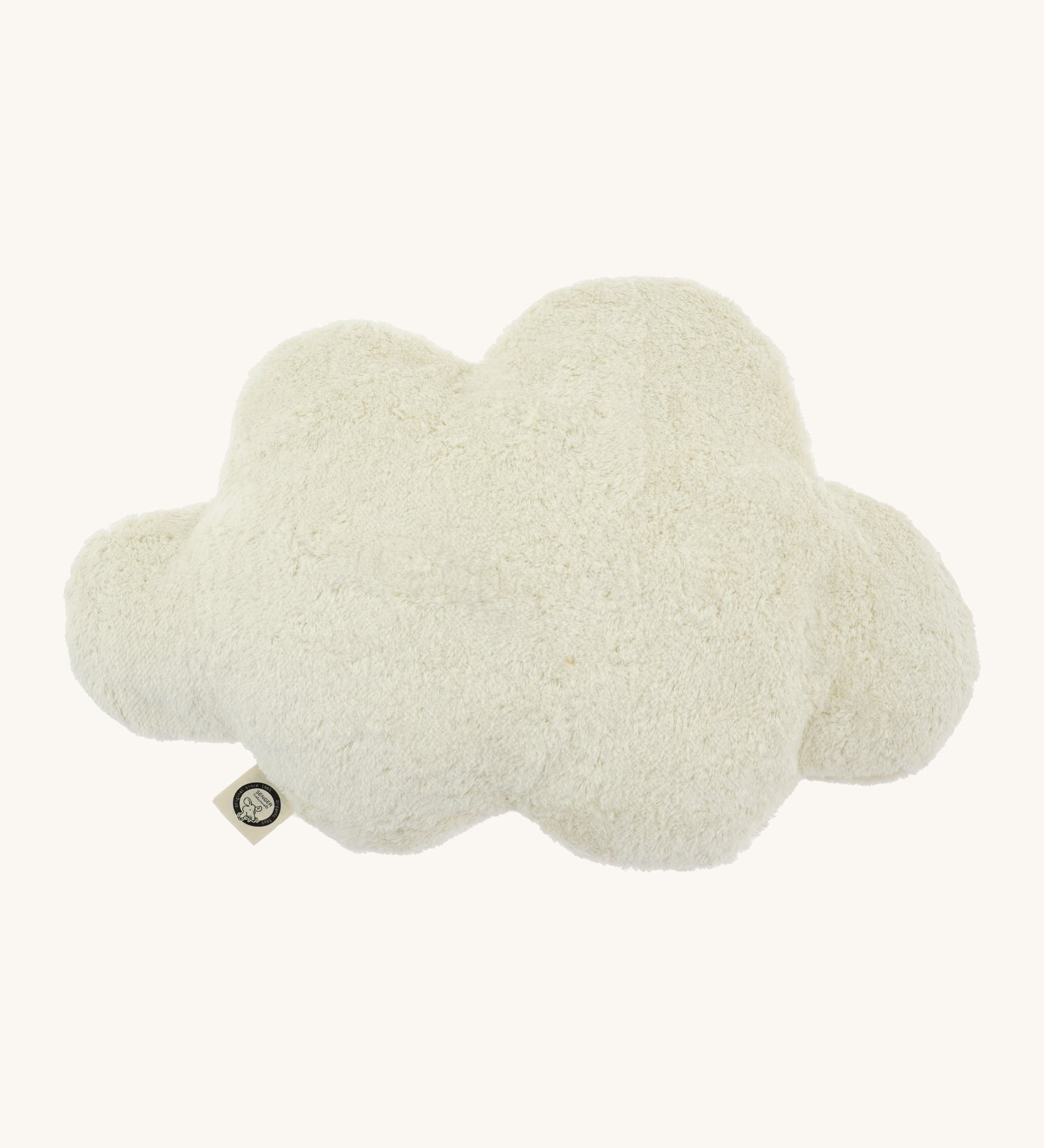 Senger warming cloud cushion. A white fluffy GOTS organic cotton cushion that can be warmed up.
