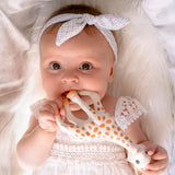 A child laid on a fluffy blanket