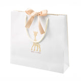 The luxury giftbag to accompany the Sophie the Giraffe Sophiestocated natural rubber baby teether gift set.