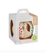 The Sophie the Giraffe natural Hevea rubber teething ball toy or babies, packaged in cardboard.