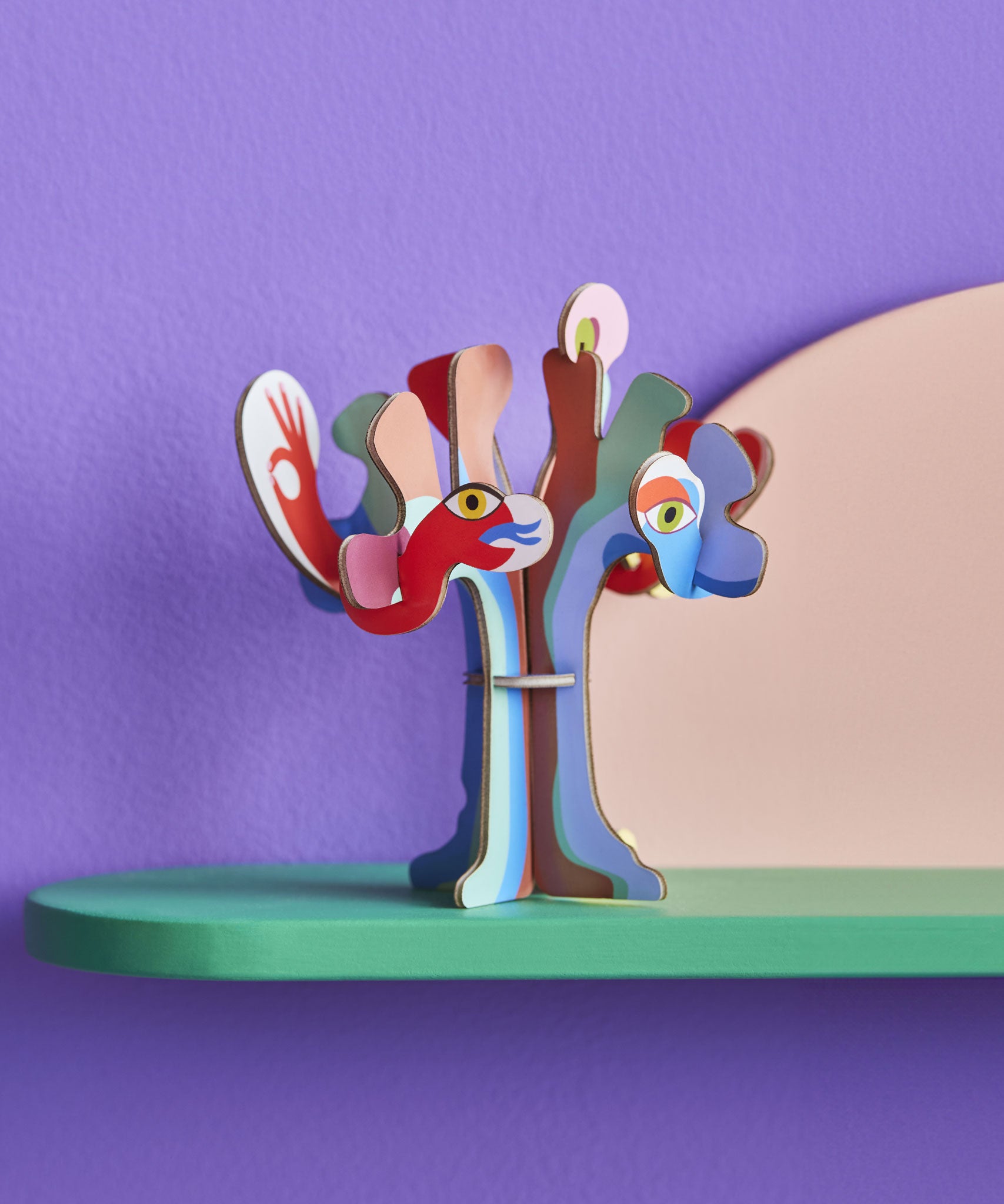 Studio Roof 3D Pop Out Card Dream Tree on a green shelf. A 3D cardboard DIY craft kit tree with different coloured leaves. This kit is part of a wide range of Studio Roof kits that are available at Babipur.