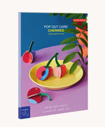 The packaging of the Studio Roof 3D Pop Out Card Cherries. This 3D pop out card DIY kit is part of Studio Roof's fruits  collection which is available at Babipur.