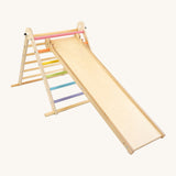 Triclimb wooden folding pikler climbing frame with pastel themed rungs showing the second side Triclimb Miri slide hooked on a rung.