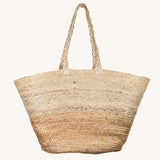 The Turtle Bags hand woven and fair trade jute basket bag with handles, and a natural colour block design