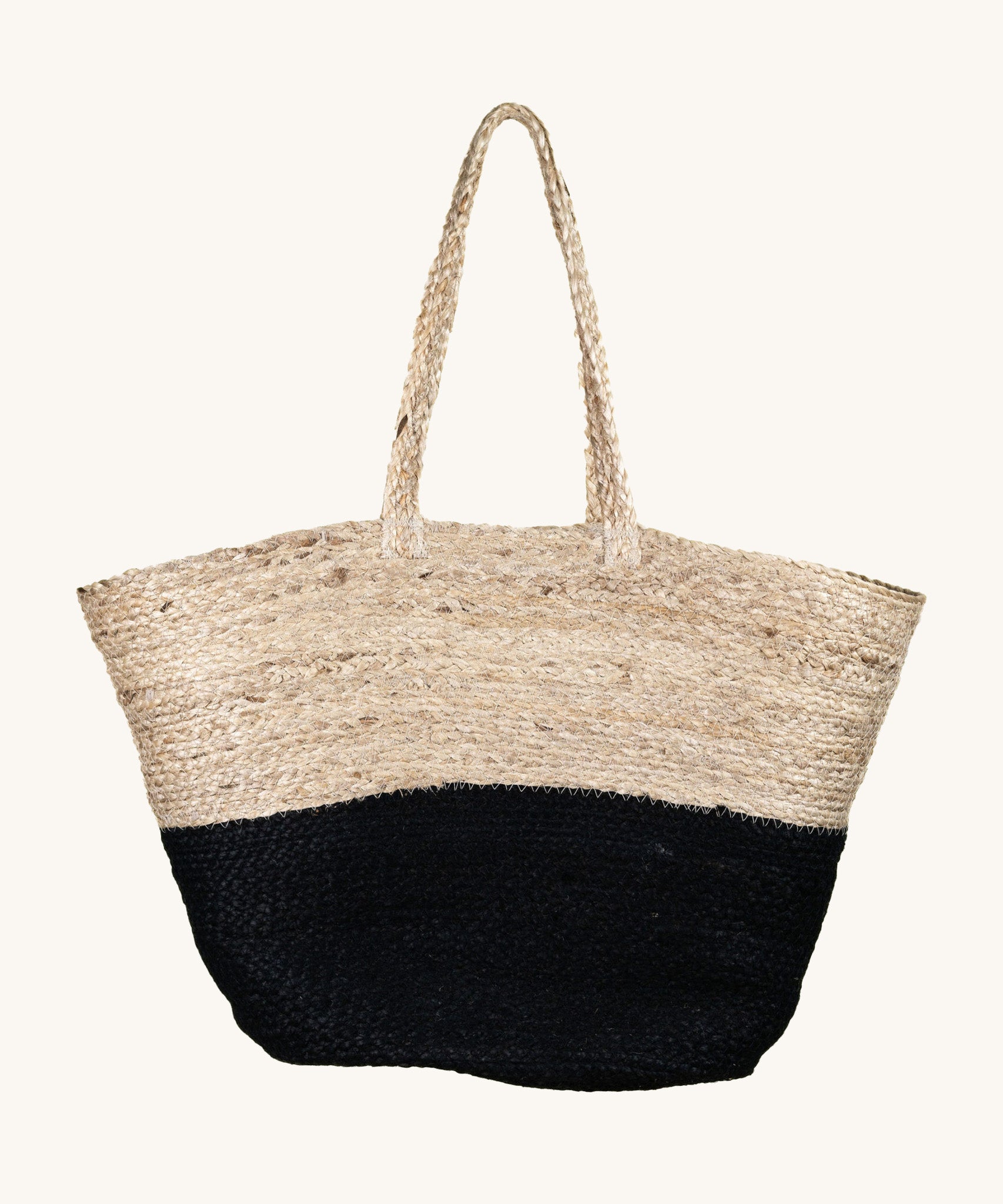 The Turtle Bags hand woven and fair trade jute basket bag with handles, and a black colour block design