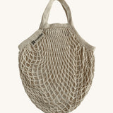 The Turtle Bags fair trade and organic cotton string net produce bag for grocery shopping, in natural beige