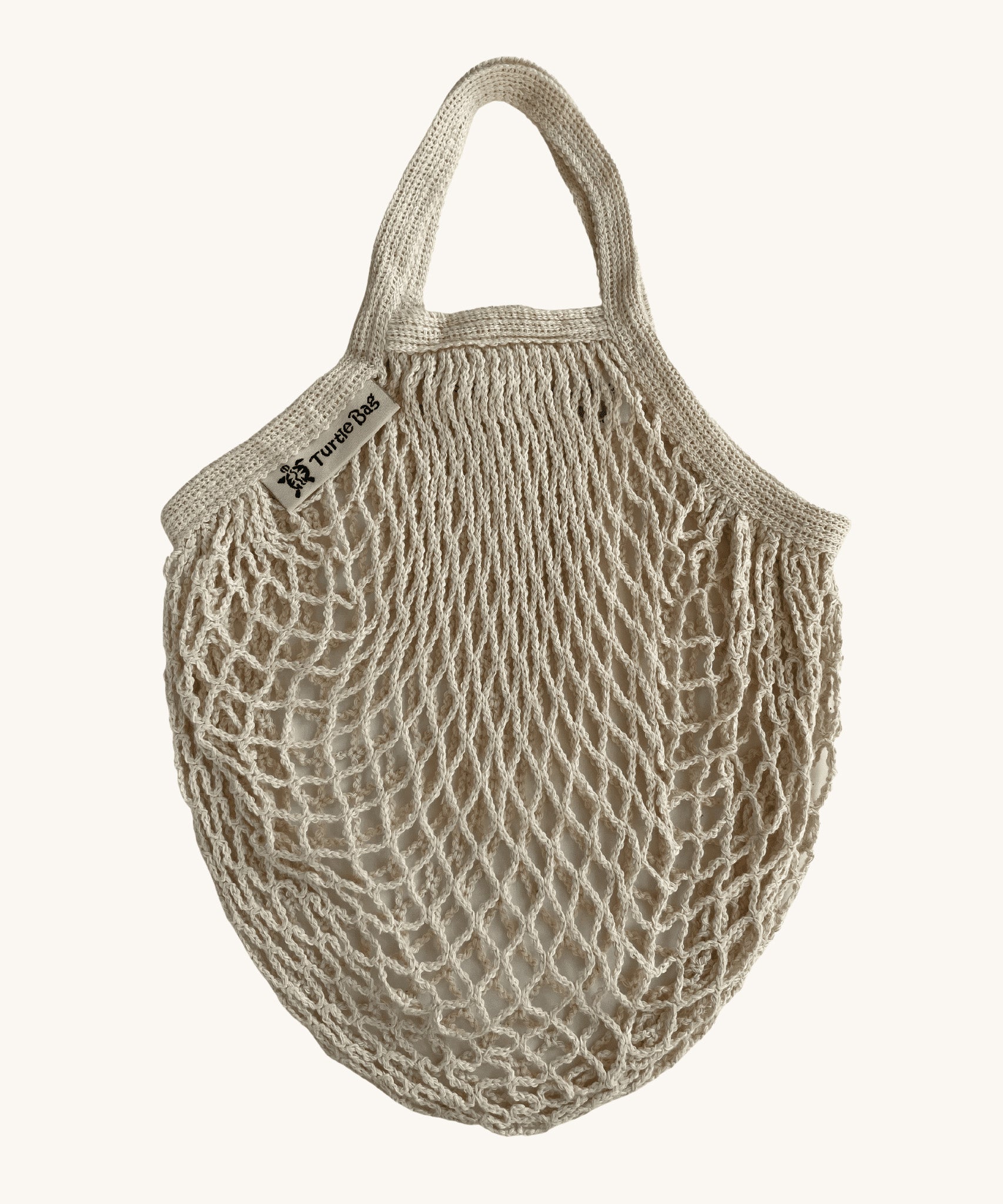 The Turtle Bags fair trade and organic cotton string net produce bag for grocery shopping, in natural beige