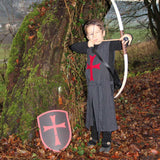 Child in fancy dress costume taking aim with the Vah Junior Wooden Bow