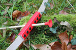 The Vah Mini Wooden Bow with Safety Arrows pictured on grass outdoors showing close up of arrow and red detail