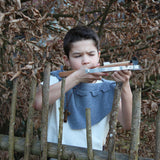 Child in fancy dress taking aim with the Vah Wooden Hunting Crossbow with Safety Arrows