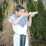 Child in fancy dress taking aim with the Vah Wooden Hunting Crossbow with Safety Arrows