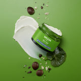 An open pot of Weleda Skin Food Nourishing Night Face Cream available at Babipur showing the texture of the cream