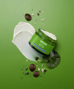 An open pot of Weleda Skin Food Nourishing Night Face Cream available at Babipur showing the texture of the cream