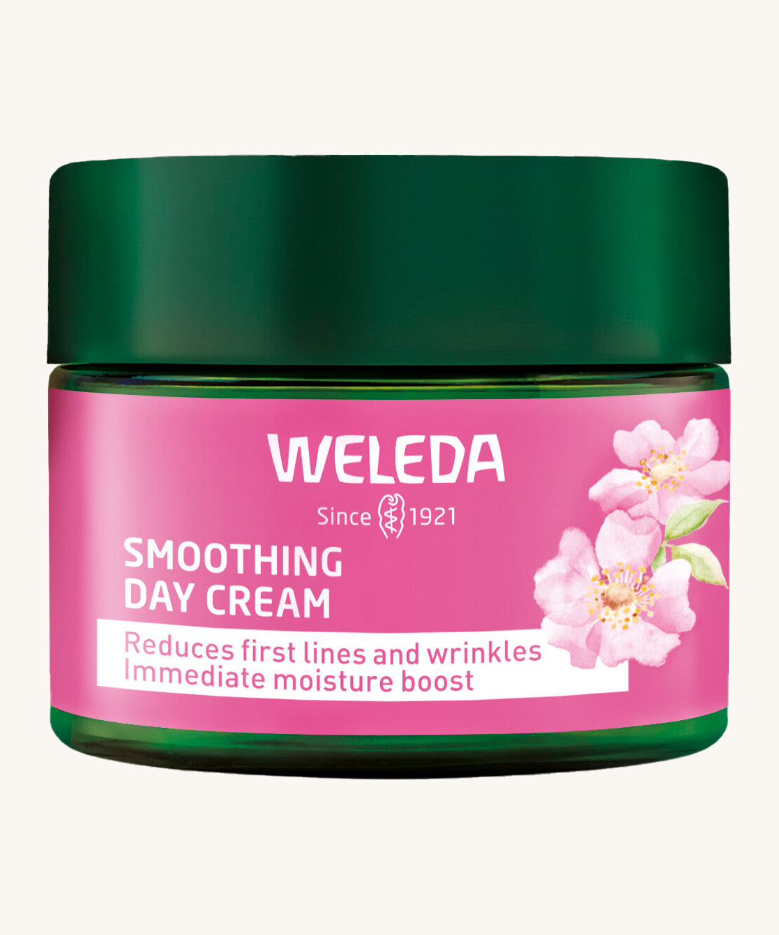 Weleda rose and white tea soothing day cream in a 40ml green jar showing the pink brand sticker