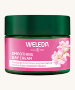 Weleda rose and white tea soothing day cream in a 40ml green jar showing the pink brand sticker