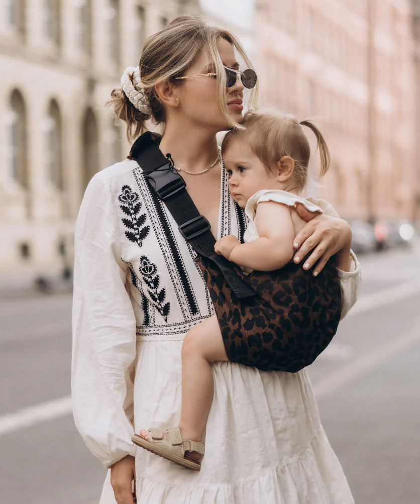 Wild ride carrier being worn my mum with baby in.