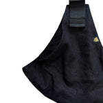 A closeup of the lovely black linen material used to make this hip seat carrier sling from Wildride