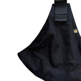 A closeup of the lovely black linen material used to make this hip seat carrier sling from Wildride