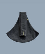 Wildride toddler carrier in graphite grey. A 100% cotton seat stylish hip carrier for babies with brand name on the strap that's folded over the carrier's seat