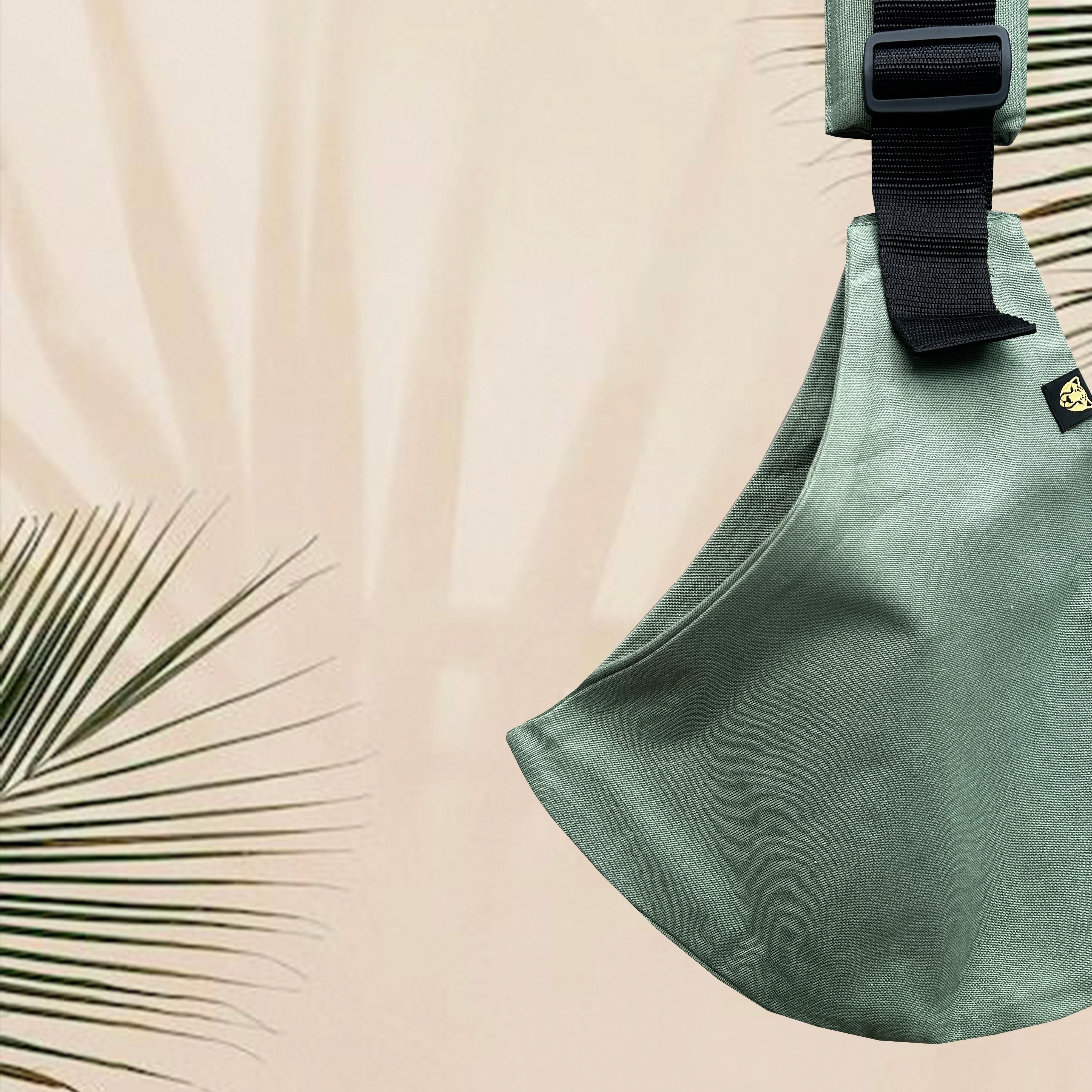 The Wildride fern green toddler carrier