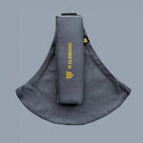 Wildride toddler carrier in an iron grey colour. A 100% cotton seat stylish hip carrier for babies with brand name on the strap that's folded over the carrier's seat