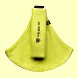 Wildride toddler carrier in lemon yellow. A 100% cotton seat stylish hip carrier for babies with brand name on the strap that's folded over the carrier's seat