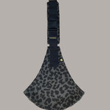 Wildride toddler carrier in a grey leopard print pattern. A 100% cotton seat stylish hip carrier for babies