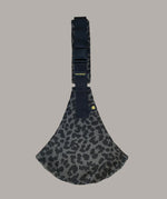 Wildride toddler carrier in a grey leopard print pattern. A 100% cotton seat stylish hip carrier for babies